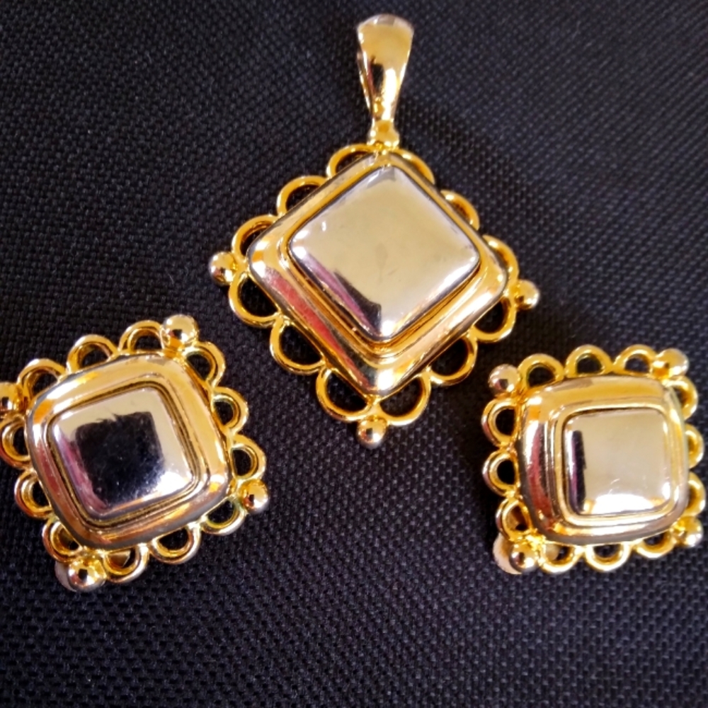 Gold tone and silver tone pendant and clip on earrings set